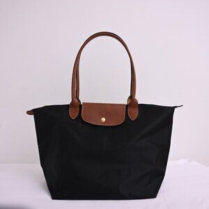 Longchamp Elegant Black and Brown Crossbody Bag